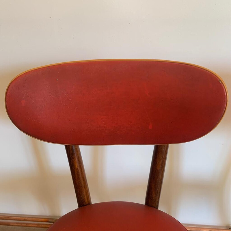 Pair of vintage red beech and skai chairs
