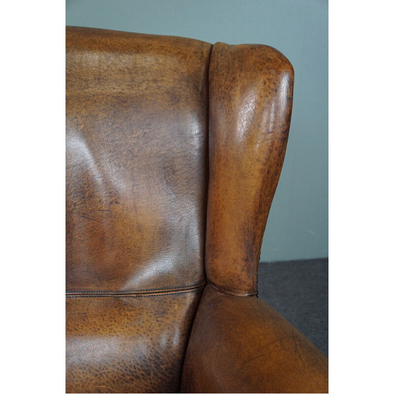 Vintage sheepskin leather wing chair