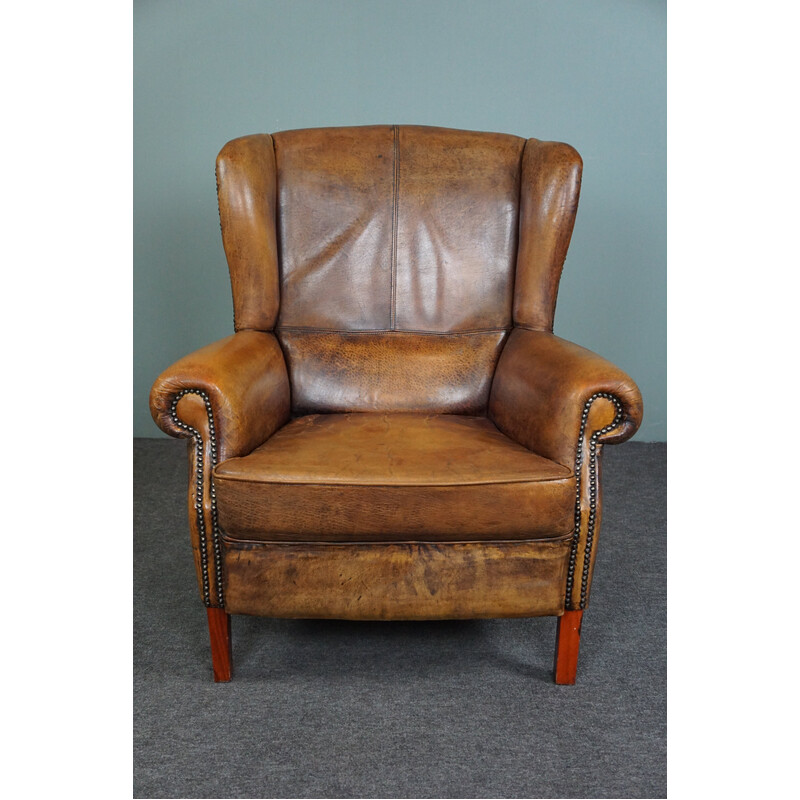 Vintage sheepskin leather wing chair