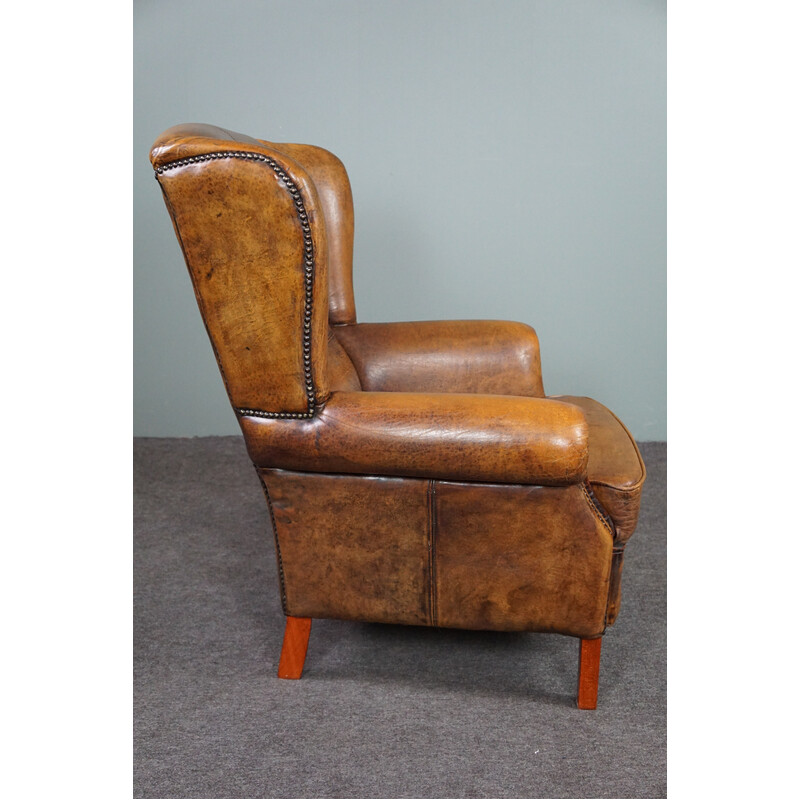 Vintage sheepskin leather wing chair