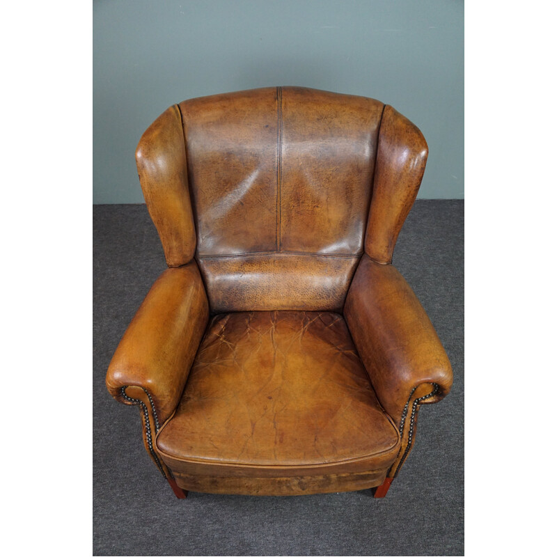 Vintage sheepskin leather wing chair