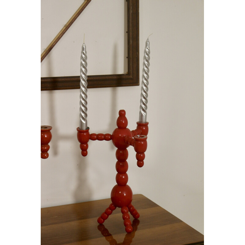 Pair of vintage candelabras in red wood, Sweden 1970