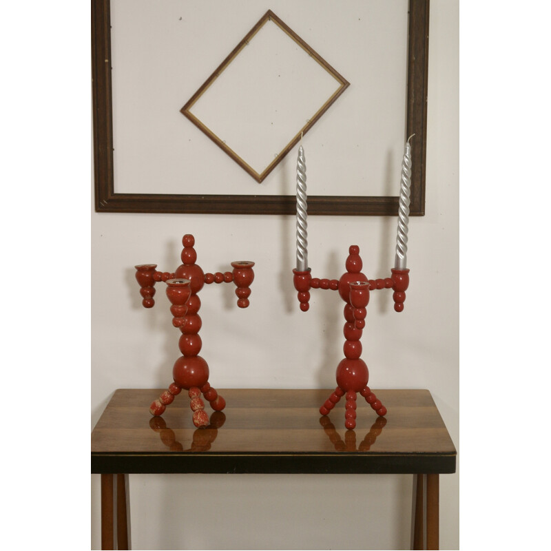 Pair of vintage candelabras in red wood, Sweden 1970