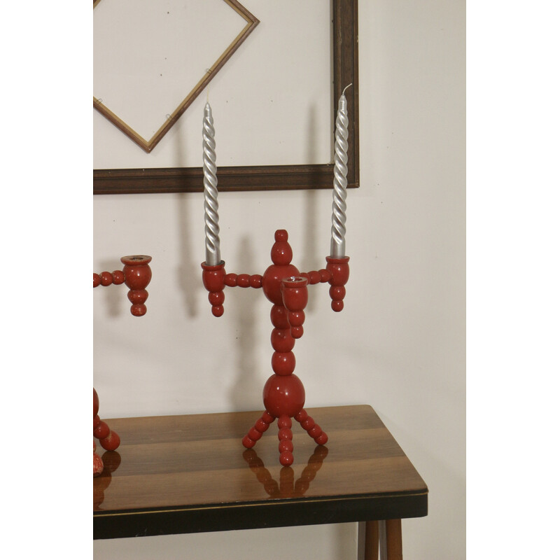 Pair of vintage candelabras in red wood, Sweden 1970