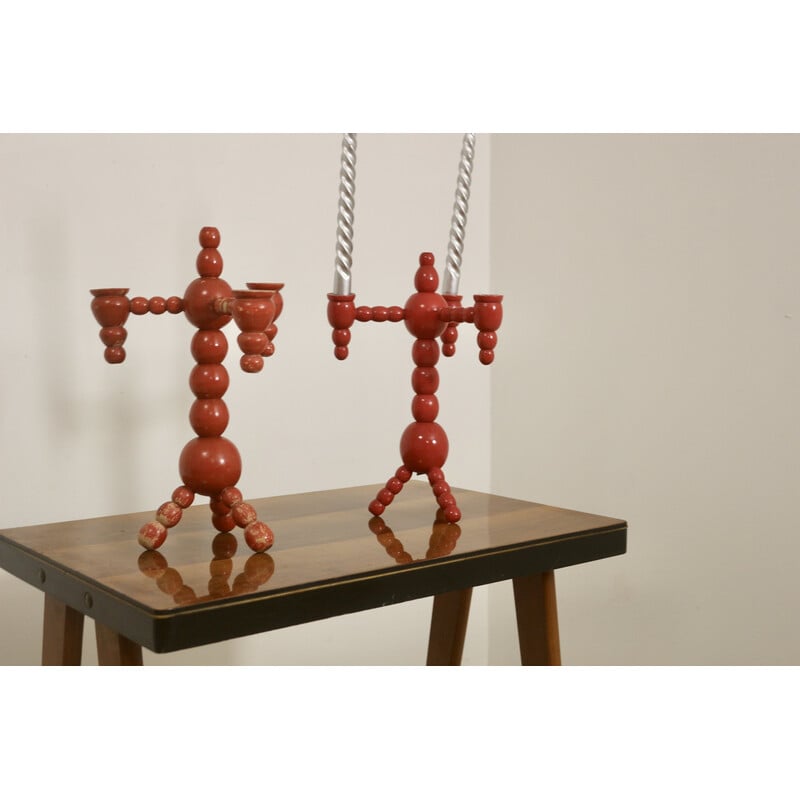 Pair of vintage candelabras in red wood, Sweden 1970