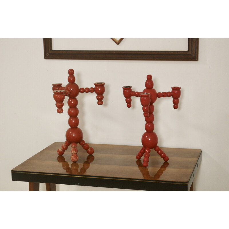 Pair of vintage candelabras in red wood, Sweden 1970