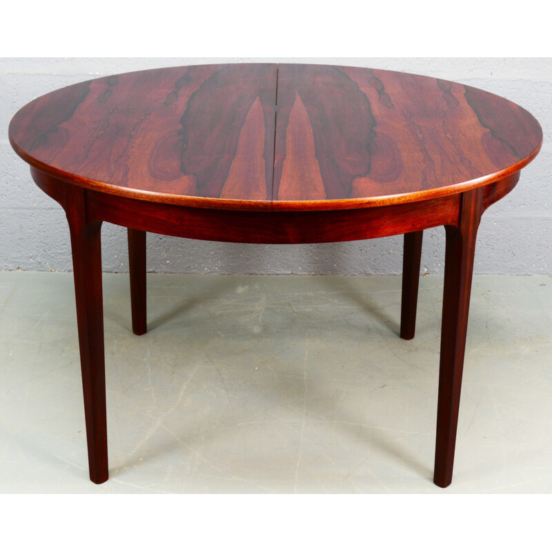 Circular rosewood extendable dining table by Nathan - 1960s