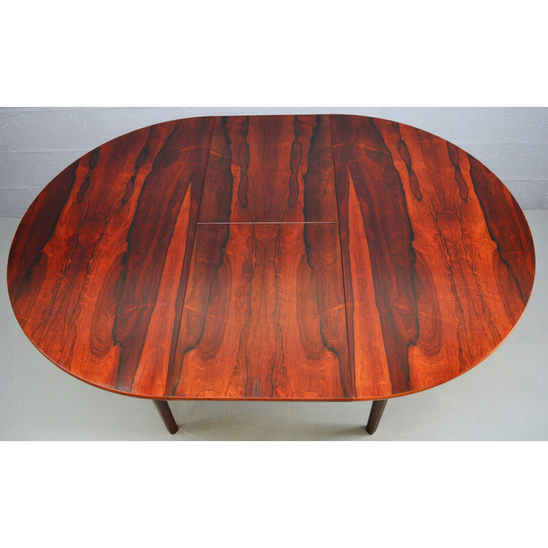 Circular rosewood extendable dining table by Nathan - 1960s
