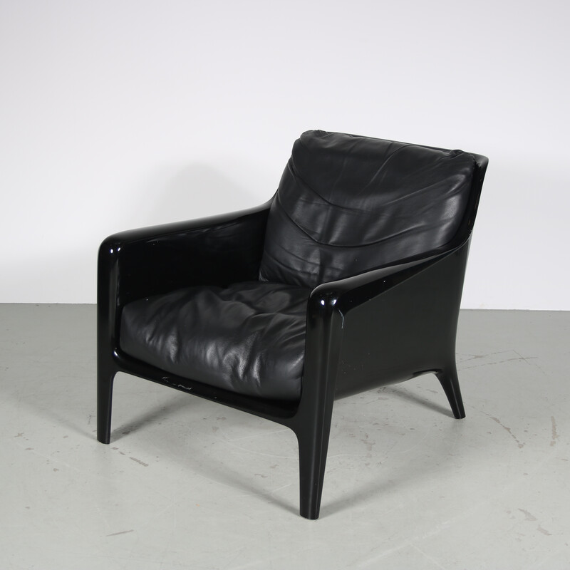 Vintage “Cocca” armchair in black plastic and cushion by Carlo Colombo for Arflex, Italy 2000