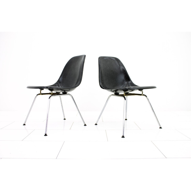 Pair of black fiberglass side chairs by Charles & Ray Eames - 1960s