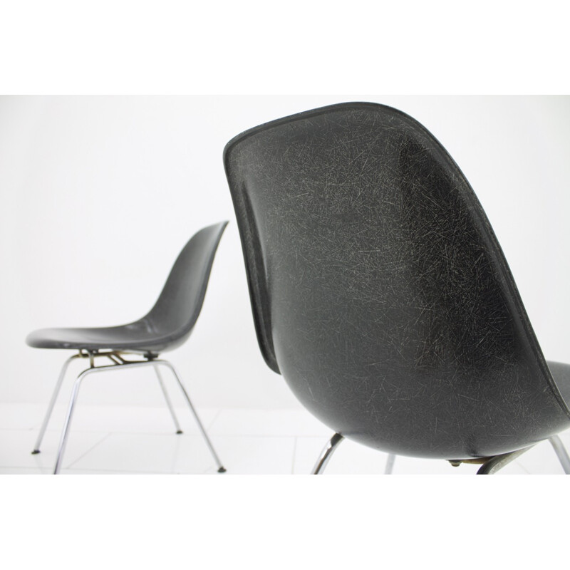 Pair of black fiberglass side chairs by Charles & Ray Eames - 1960s