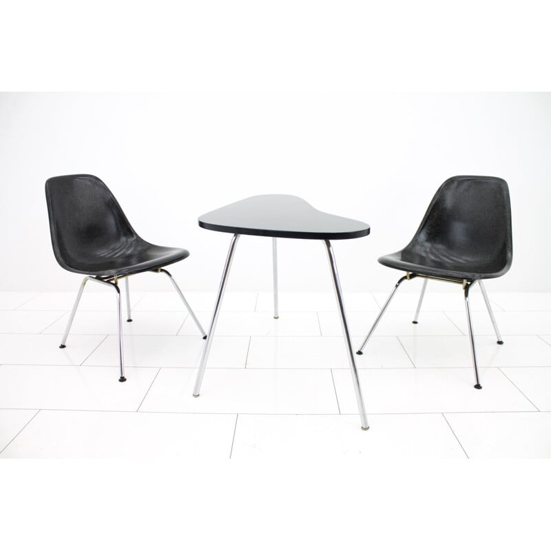 Pair of black fiberglass side chairs by Charles & Ray Eames - 1960s