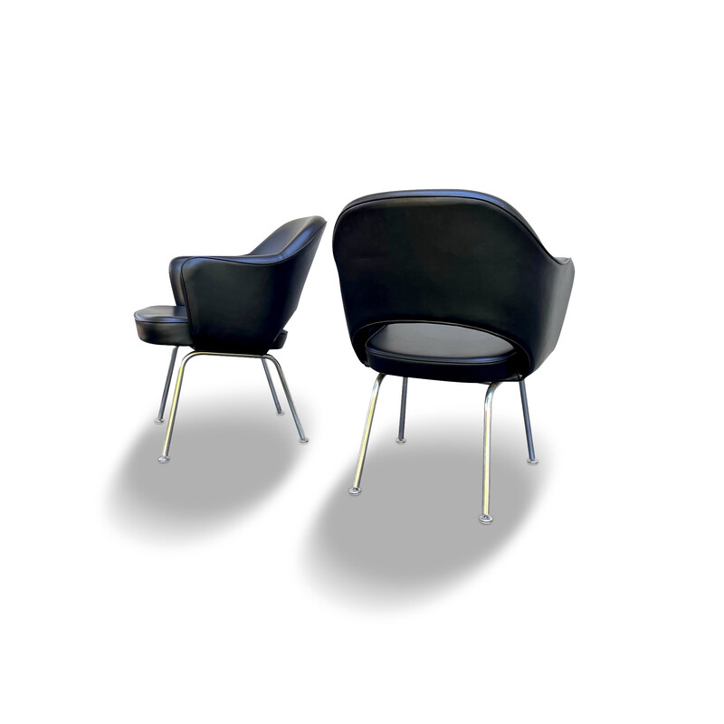 Pair of vintage "Conference" armchairs in black leatherette and chrome by Eero Saarinen for Knoll International