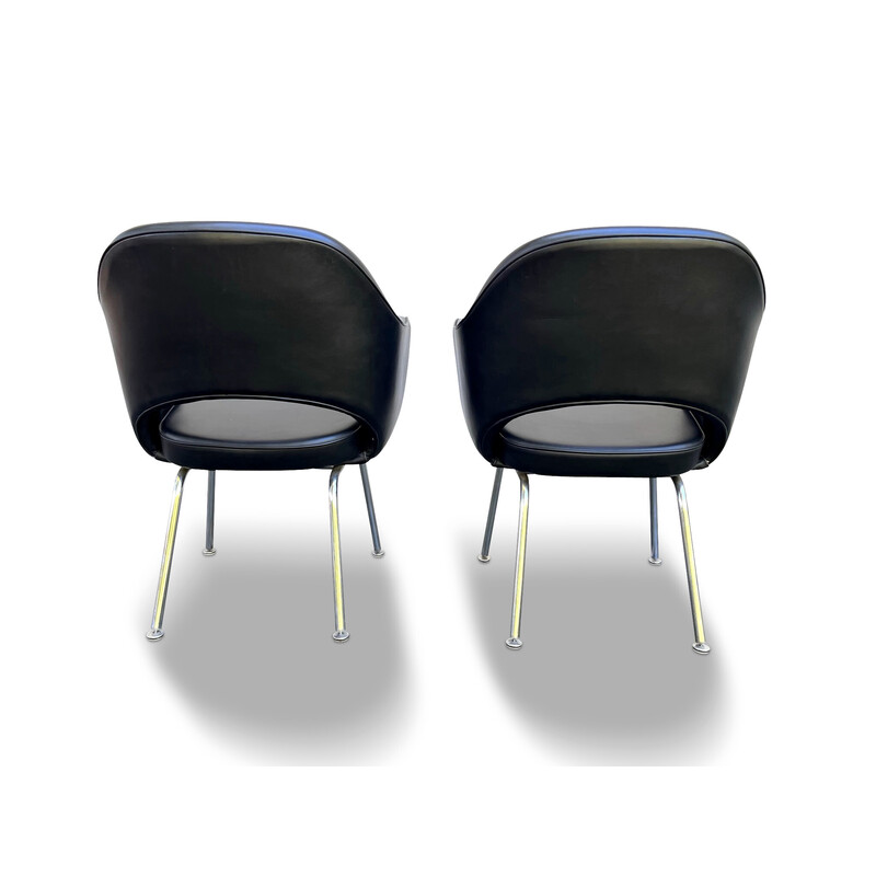 Pair of vintage "Conference" armchairs in black leatherette and chrome by Eero Saarinen for Knoll International