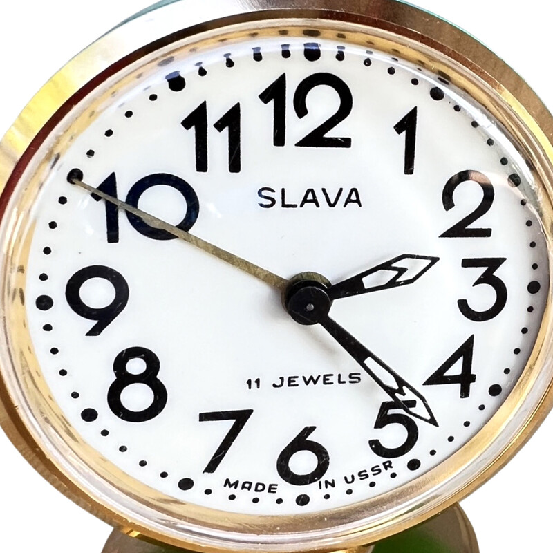 Vintage mechanical alarm clock in steel and brass for Slava, USSR 1960
