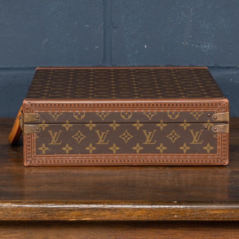 Vintage watch case with monogram pattern by Louis Vuitton, France