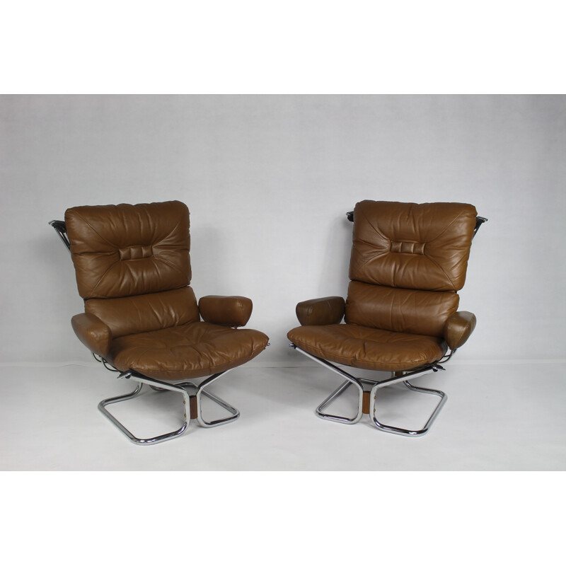 Fauteuil lounge marron en cuir et en palissandre d'Ingmar Relling - 1970