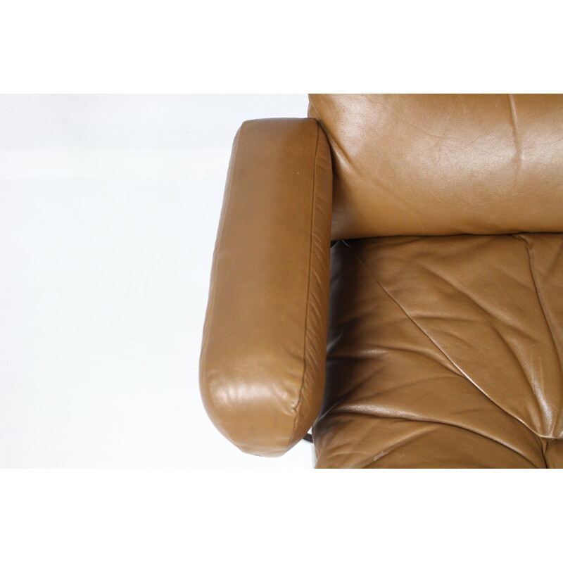 Fauteuil lounge marron en cuir et en palissandre d'Ingmar Relling - 1970