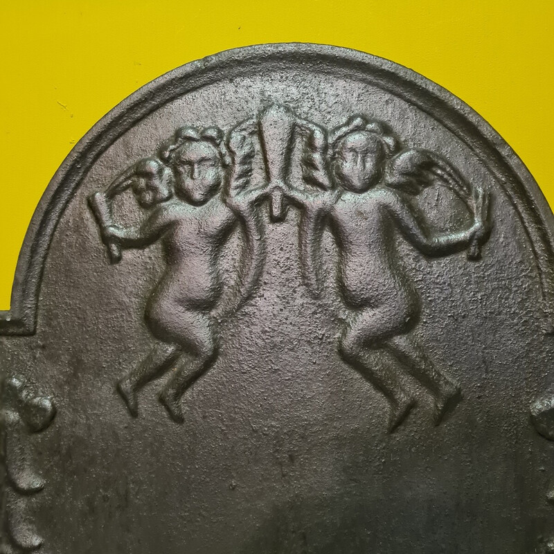 Vintage cast iron fireback depicting 2 angels, Netherlands