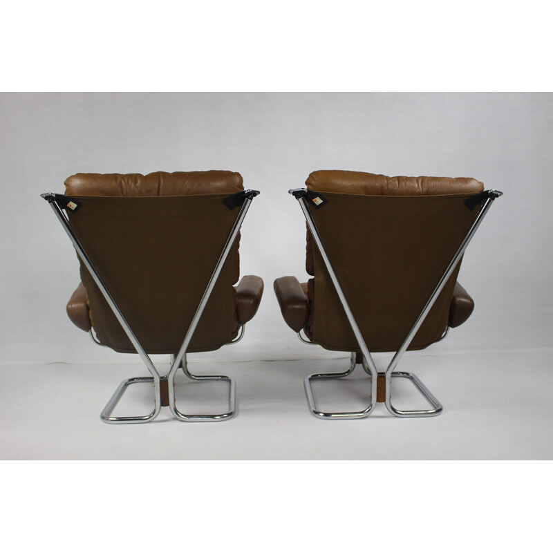 Fauteuil lounge marron en cuir et en palissandre d'Ingmar Relling - 1970