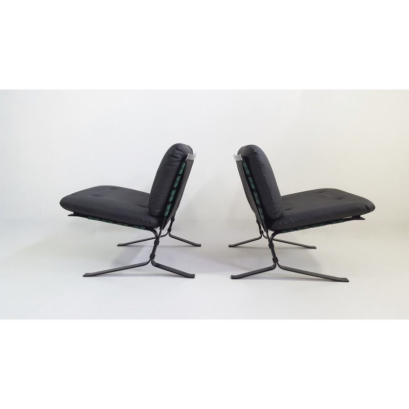 Pair of black leatherette and metal Airborne low chairs by Olivier Mourgue - 1960s