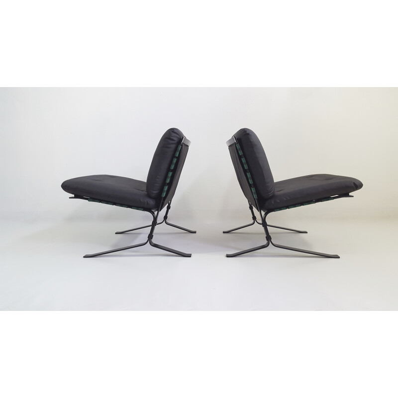 Pair of black leatherette and metal Airborne low chairs by Olivier Mourgue - 1960s