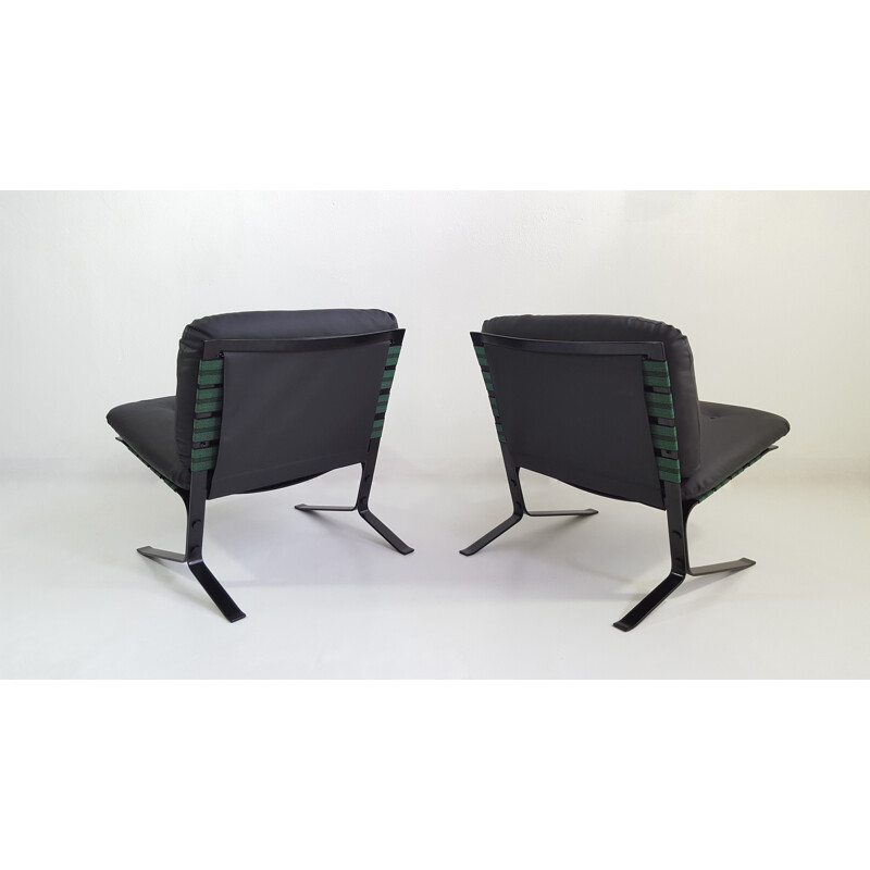 Pair of black leatherette and metal Airborne low chairs by Olivier Mourgue - 1960s