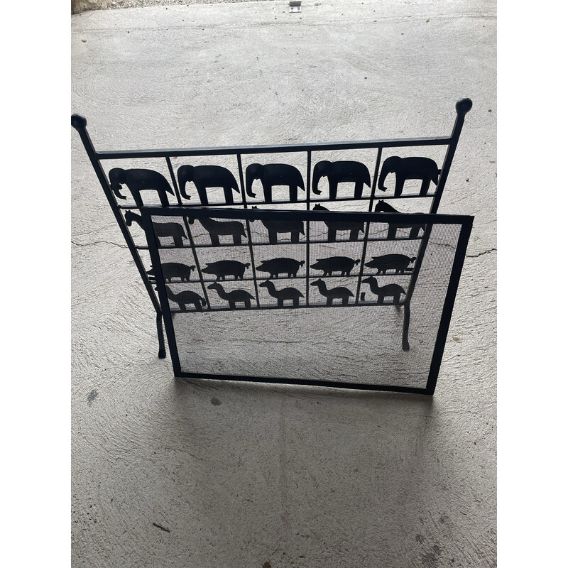 Vintage cast iron fire screen with animal decor