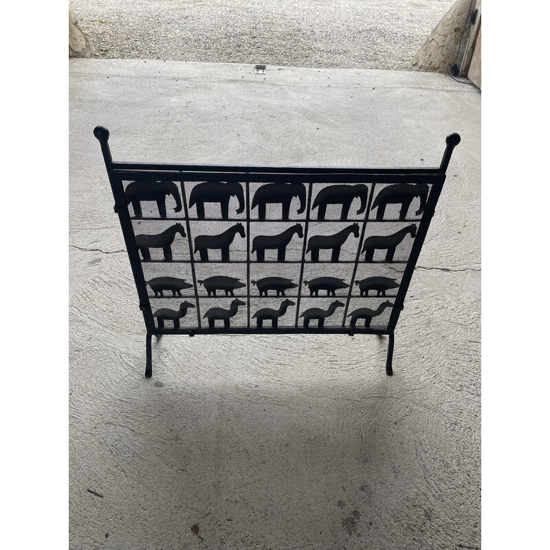 Vintage cast iron fire screen with animal decor