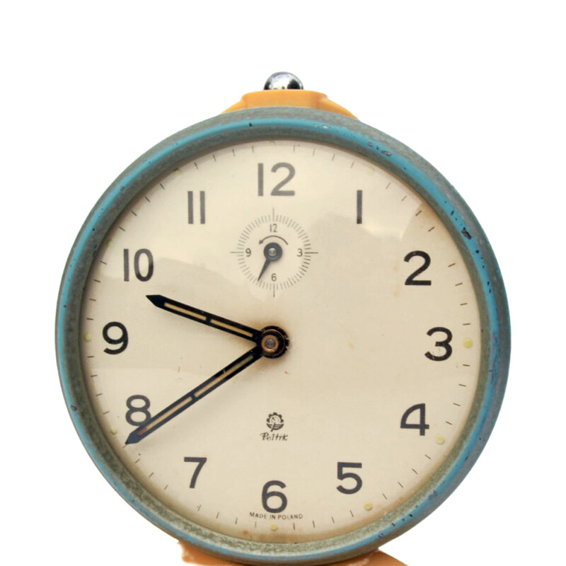 Vintage mechanical alarm clock in enameled steel and plastic for Poltik, Poland 1960