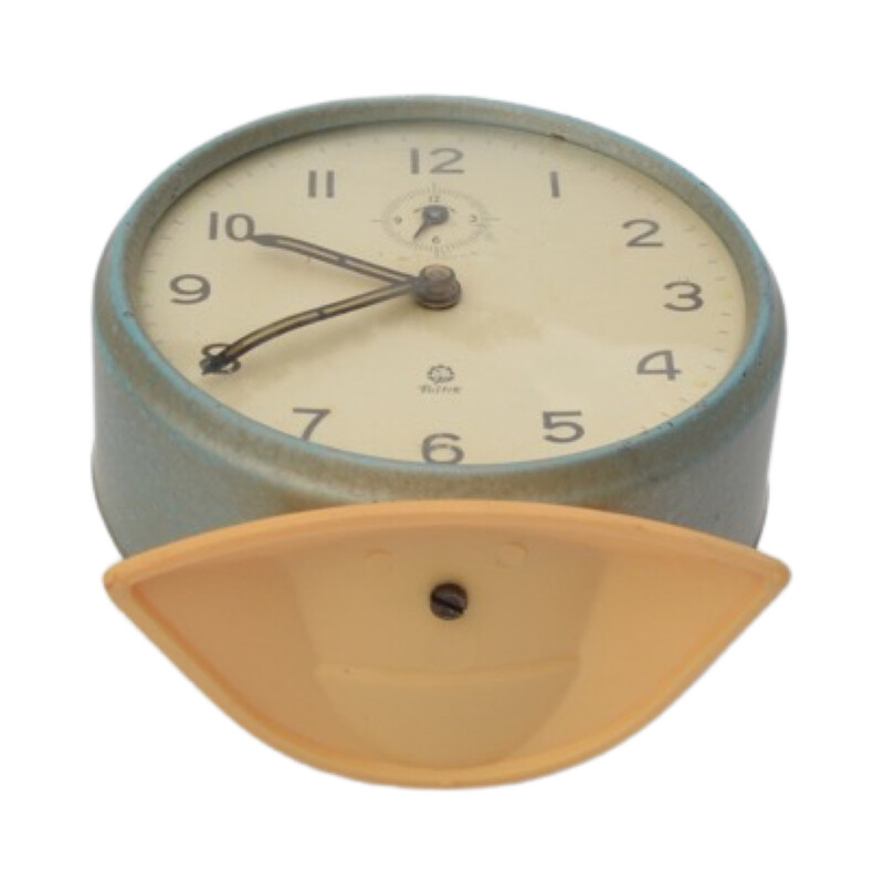 Vintage mechanical alarm clock in enameled steel and plastic for Poltik, Poland 1960