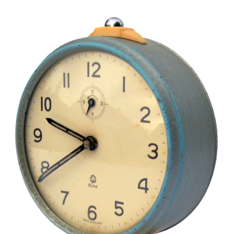 Vintage mechanical alarm clock in enameled steel and plastic for Poltik, Poland 1960