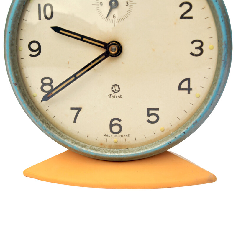 Vintage mechanical alarm clock in enameled steel and plastic for Poltik, Poland 1960