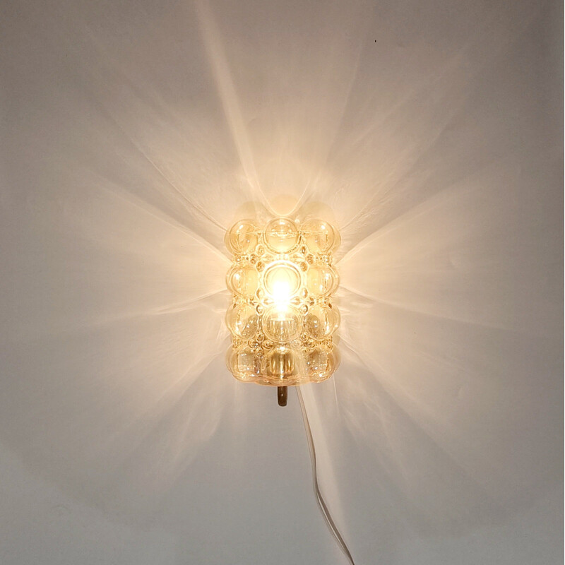 Vintage wall lamp in amber bubbled glass and brass by Helena Tynell for Limburg, Germany 1960