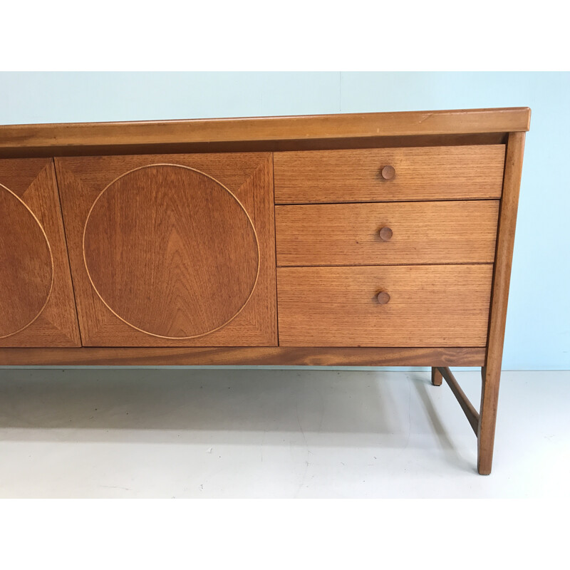 Sideboard with circles on the doors in teak made by Nathan - 1960s 