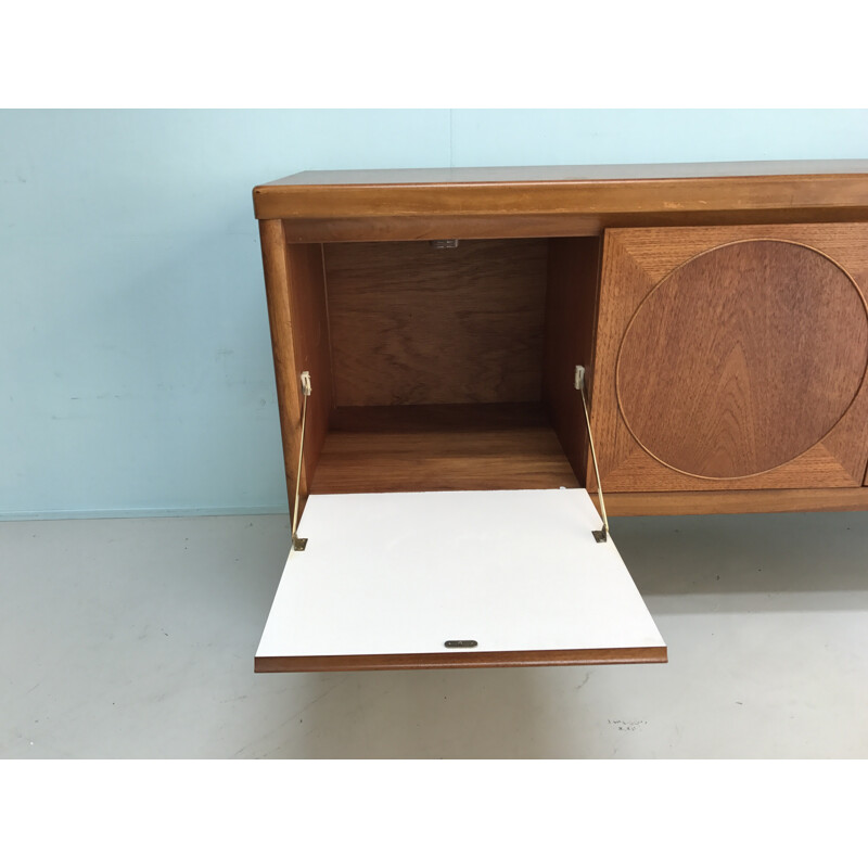 Sideboard with circles on the doors in teak made by Nathan - 1960s 