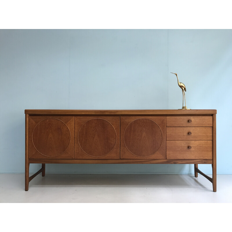 Sideboard with circles on the doors in teak made by Nathan - 1960s 