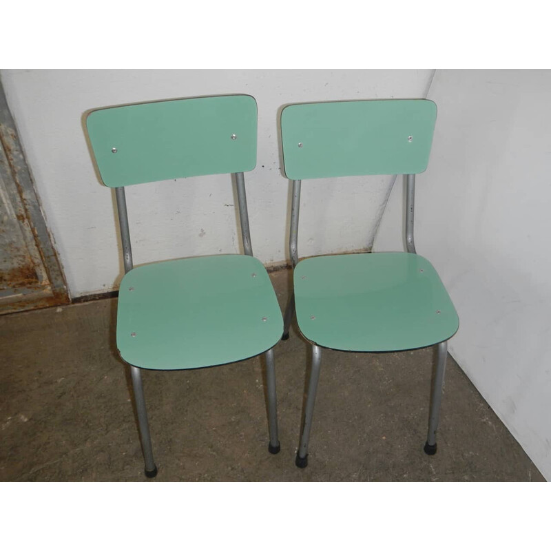 Pareja de sillas infantiles vintage de metal y formica verde