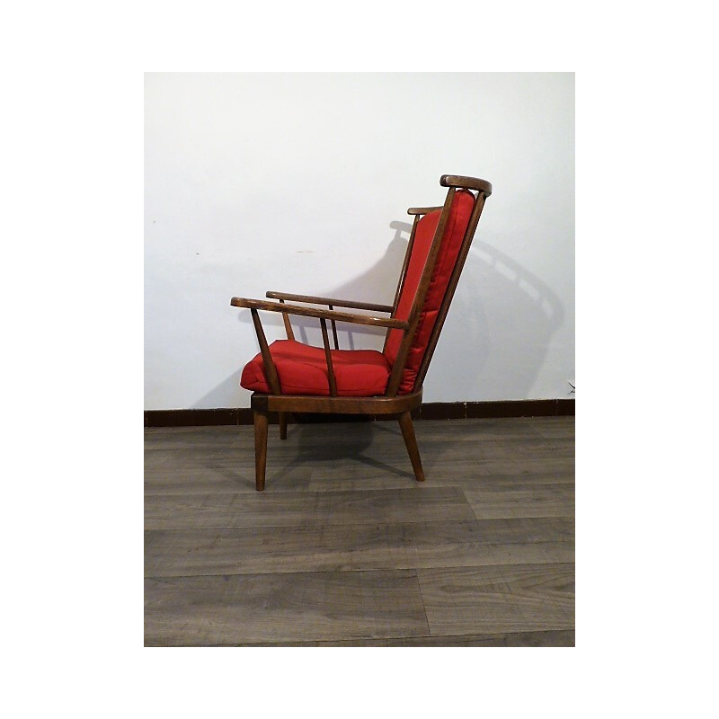 Baumann red armchair with wooden frame - 1960s