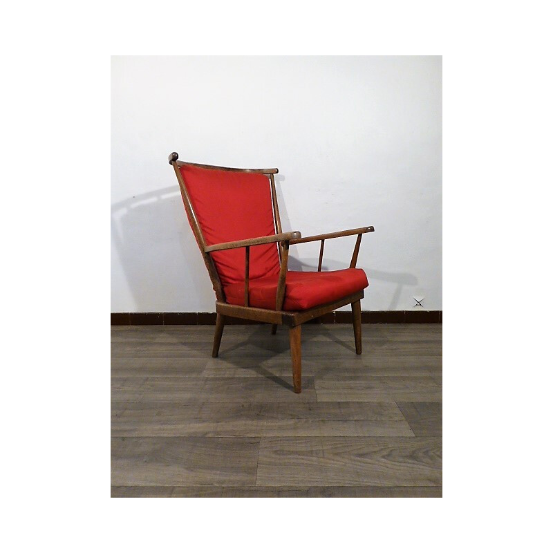 Baumann red armchair with wooden frame - 1960s