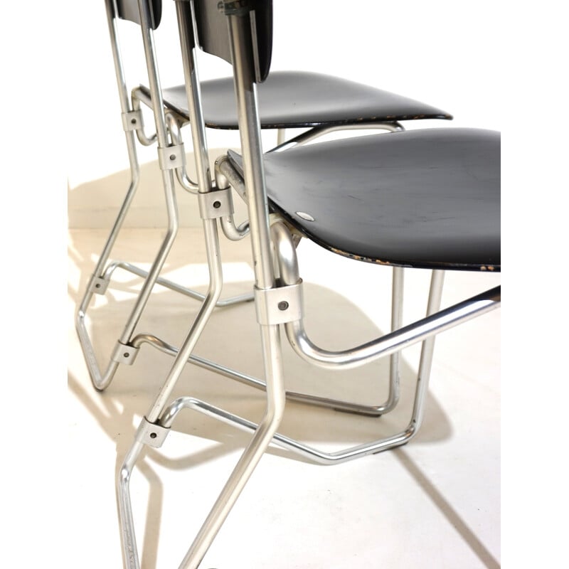 Set of 4 vintage stackable chairs in aluminum and black wood by Armin Wirth for Ph. Zieringer, 1950