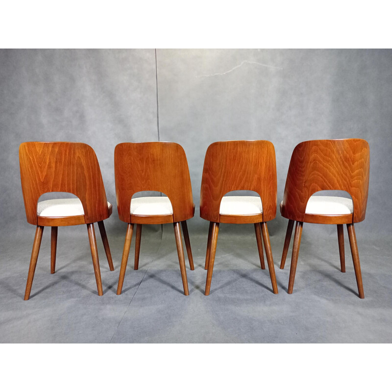 Set of 4 vintage chairs in walnut and Boucle fabric by Oswald Haerdtt for Ton, 1955