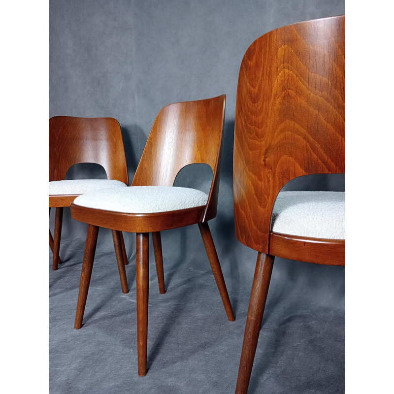 Set of 4 vintage chairs in walnut and Boucle fabric by Oswald Haerdtt for Ton, 1955