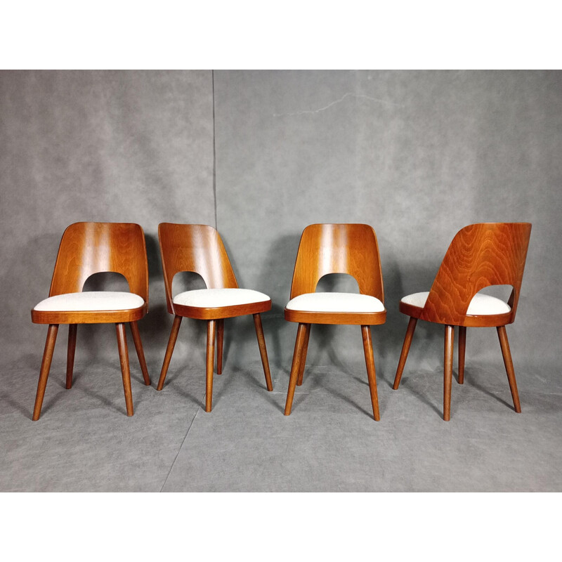 Set of 4 vintage chairs in walnut and Boucle fabric by Oswald Haerdtt for Ton, 1955