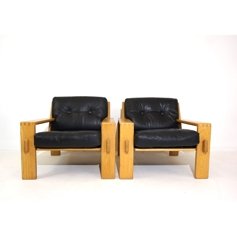 Paire de fauteuils vintage en cuir noir et bois par Esko Pajamies, 1960