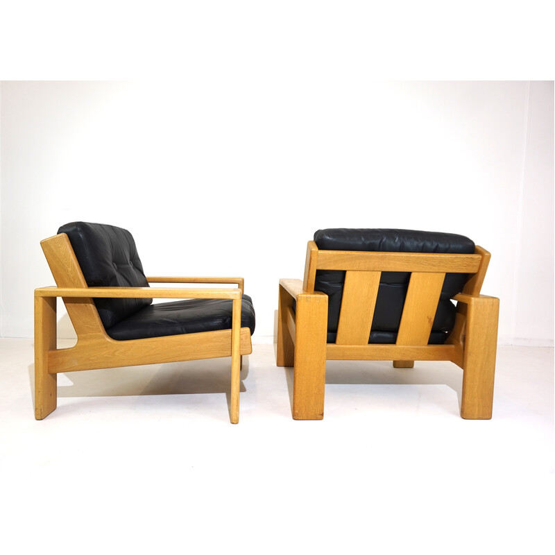 Paire de fauteuils vintage en cuir noir et bois par Esko Pajamies, 1960