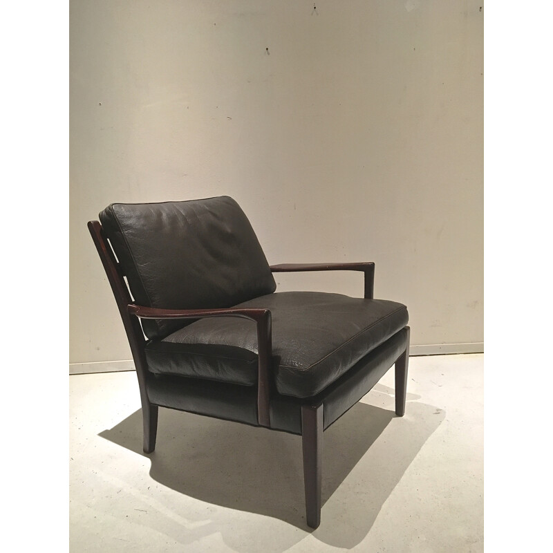 Fauteuil lounge en cuir noir de Arne Norell - 1960