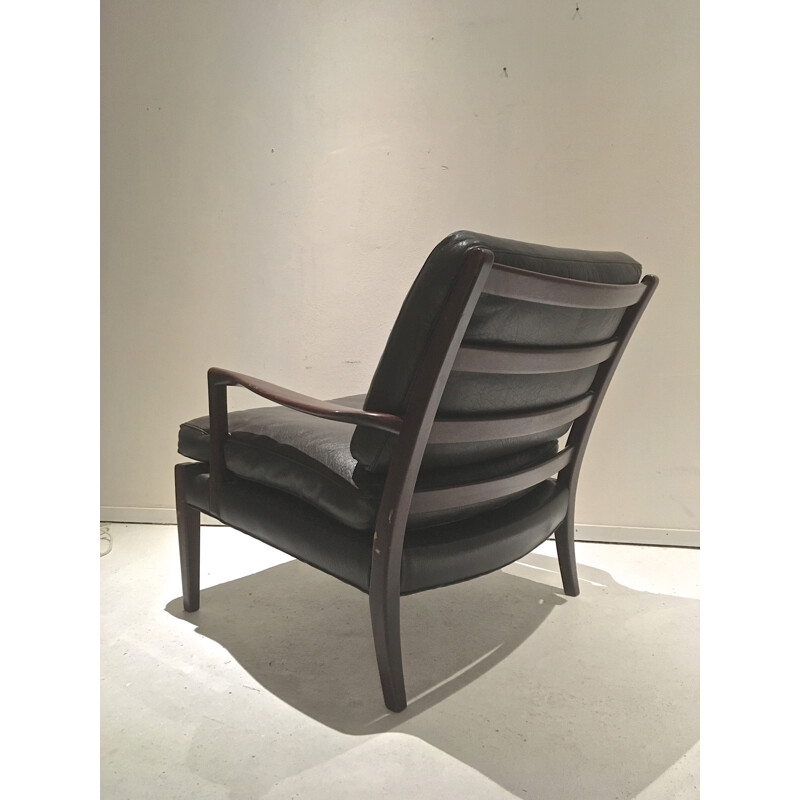 Fauteuil lounge en cuir noir de Arne Norell - 1960