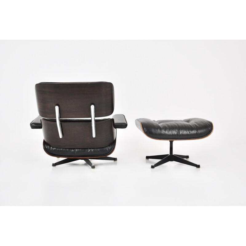 Fauteuil vintage avec ottoman en cuir noir et bois de Charles et Ray Eames pour Icf, 1970