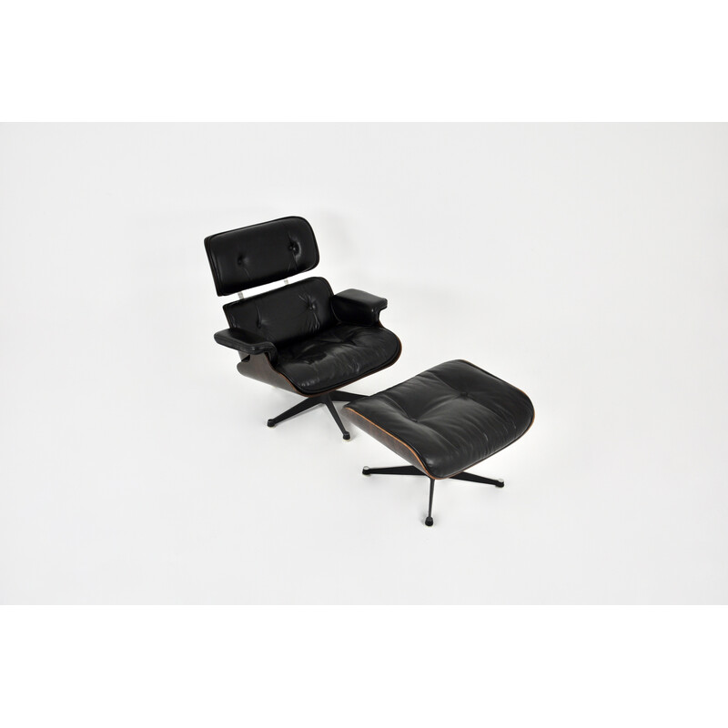 Fauteuil vintage avec ottoman en cuir noir et bois de Charles et Ray Eames pour Icf, 1970